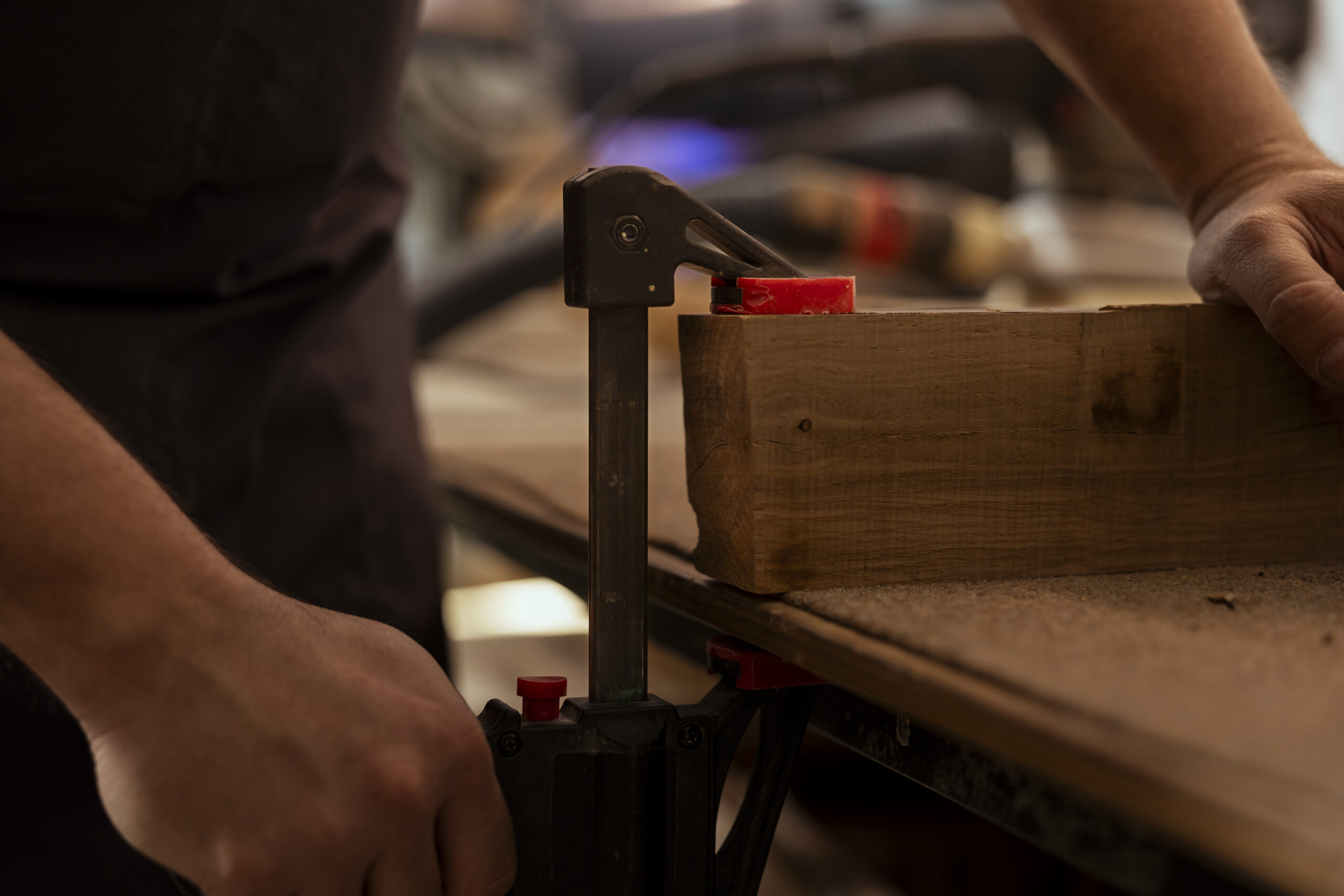 carpenter using bench vise hold timber block starting furniture assembling scaled.jpg